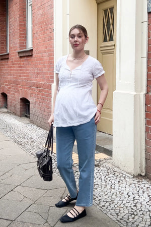 Jasnoniebieskie elastyczne dżinsy ciążowe