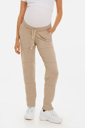 Sportowe spodnie ciążowe – beżowe