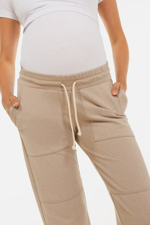 Sportowe spodnie ciążowe – beżowe