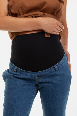 Elastyczne niebieskie dżinsy ciążowe