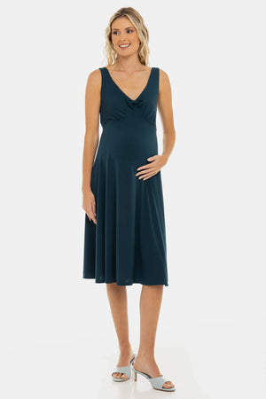 Zwiewna sukienka ciążowa z marszczeniami i kokardą - turkusowa