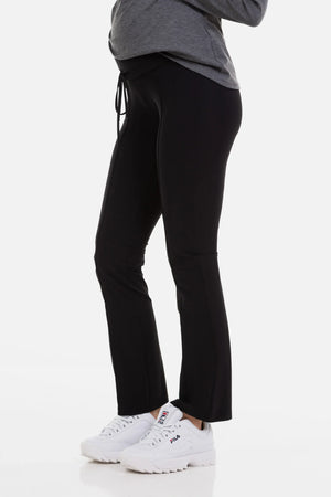 Elastyczne spodnie ciążowe z szerokim pasem