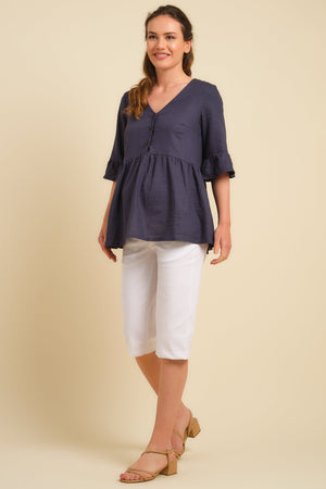 Białe elastyczne spodnie ciążowe 3/4